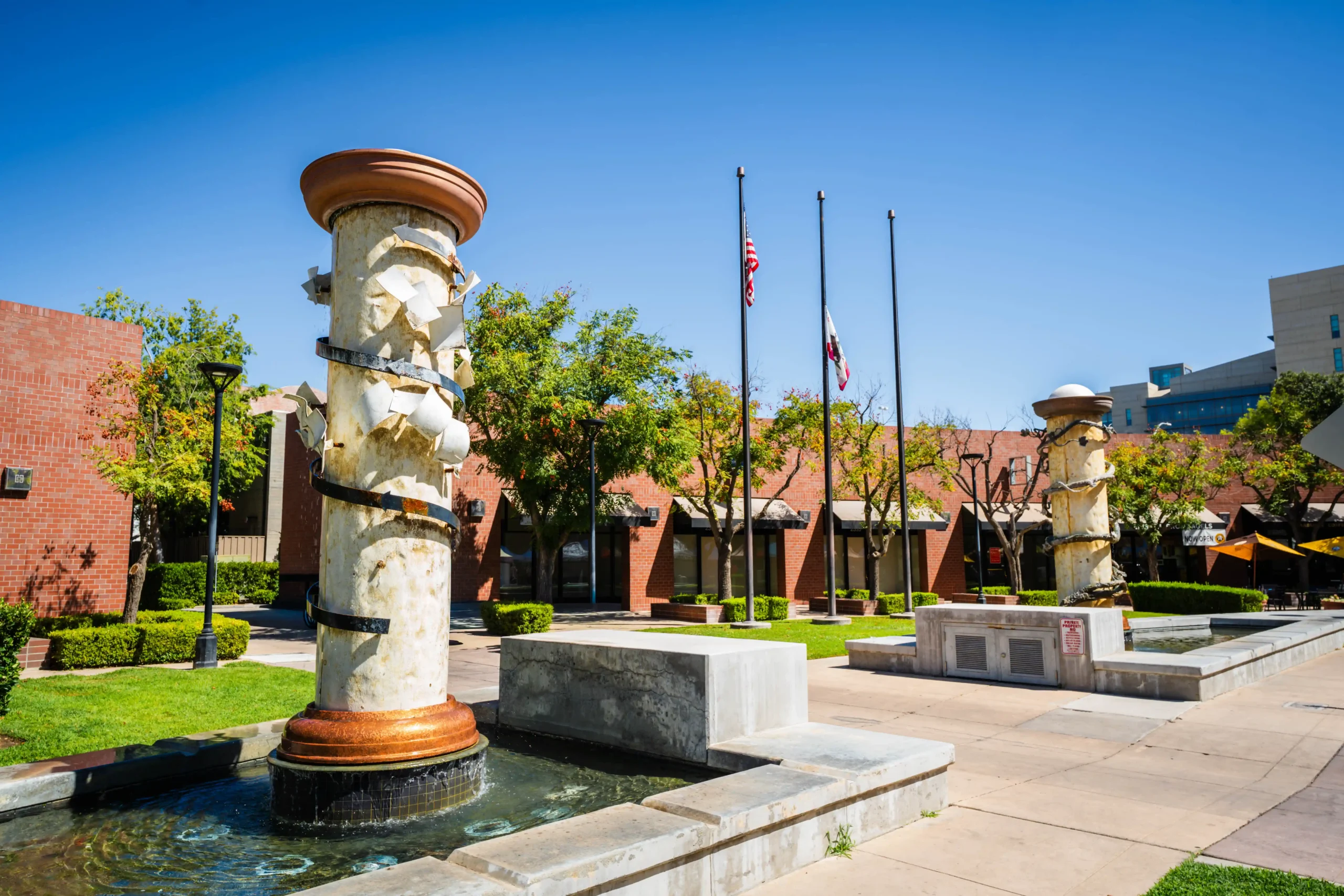 Wide view of fountain courtyard outside the Crescent building