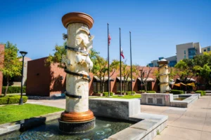 Fountain and pillars at Civic Center Square by the Crescent Building