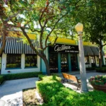 Exterior of The Galleria with striped awnings