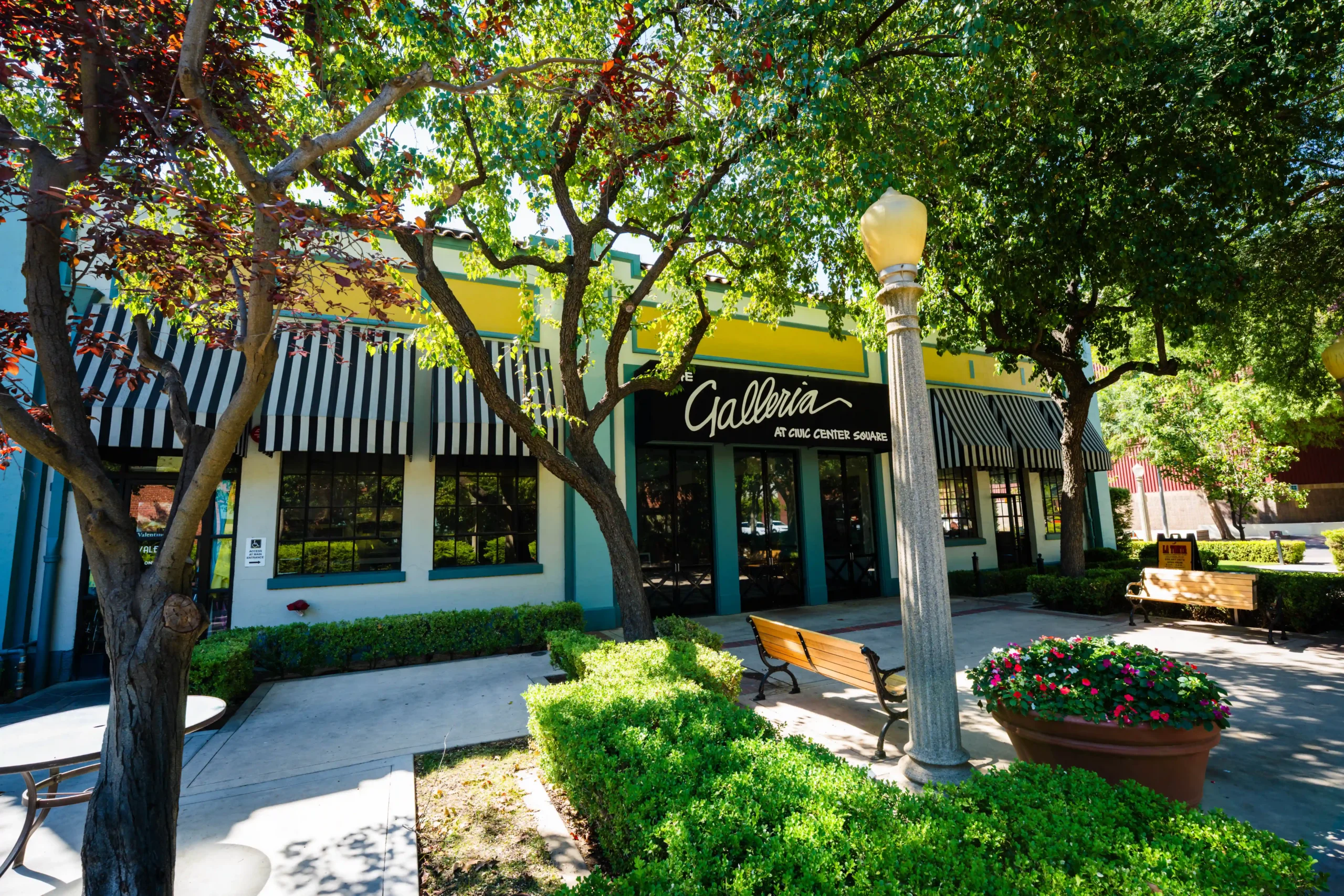 Exterior of The Galleria with striped awnings